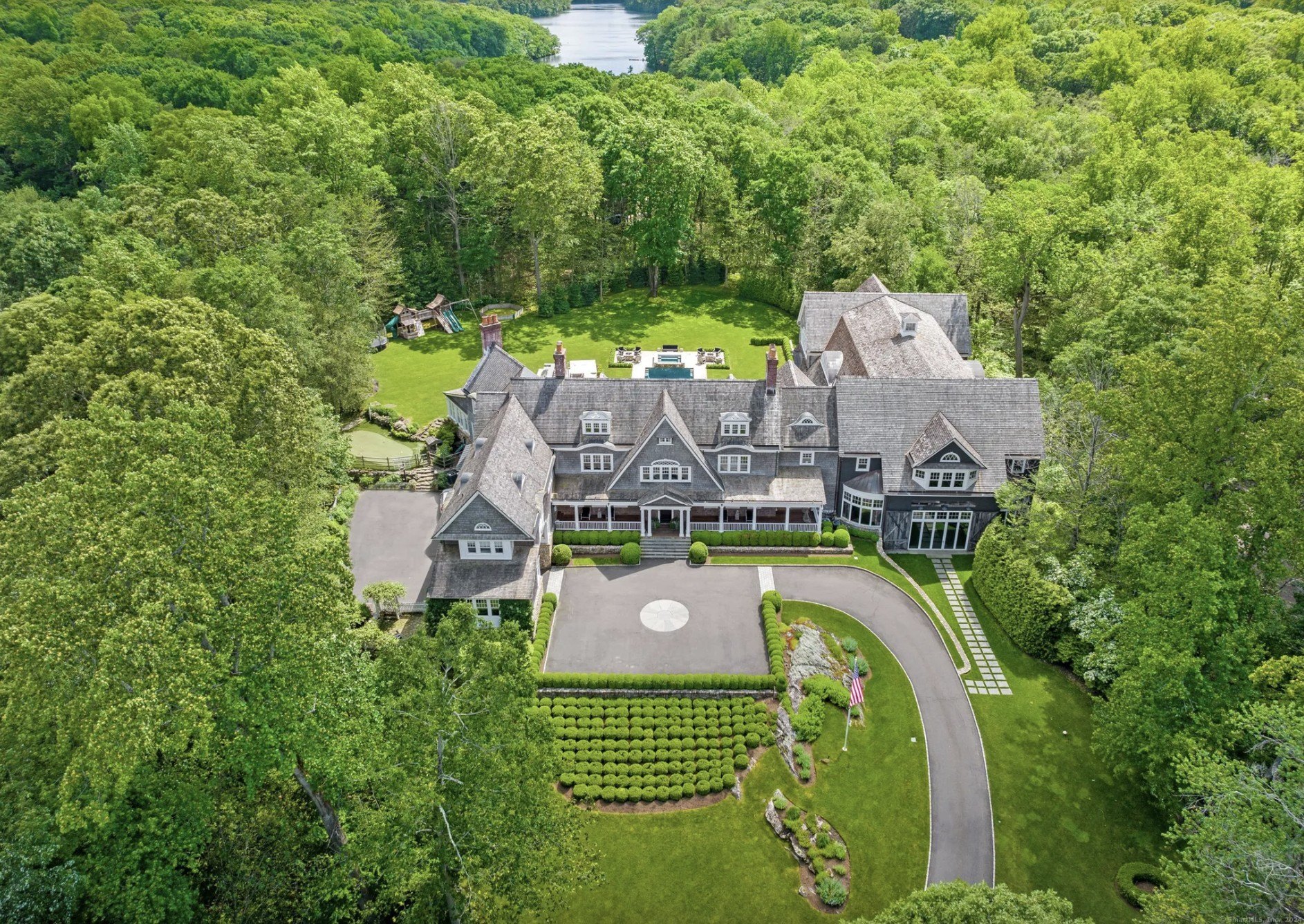 This sprawling 6-bedroom, 7.5-bath home on a 10-acre lot at 9 Cowdray Dr., Greenwich, CT 06831, is listed for $16.5 million. 