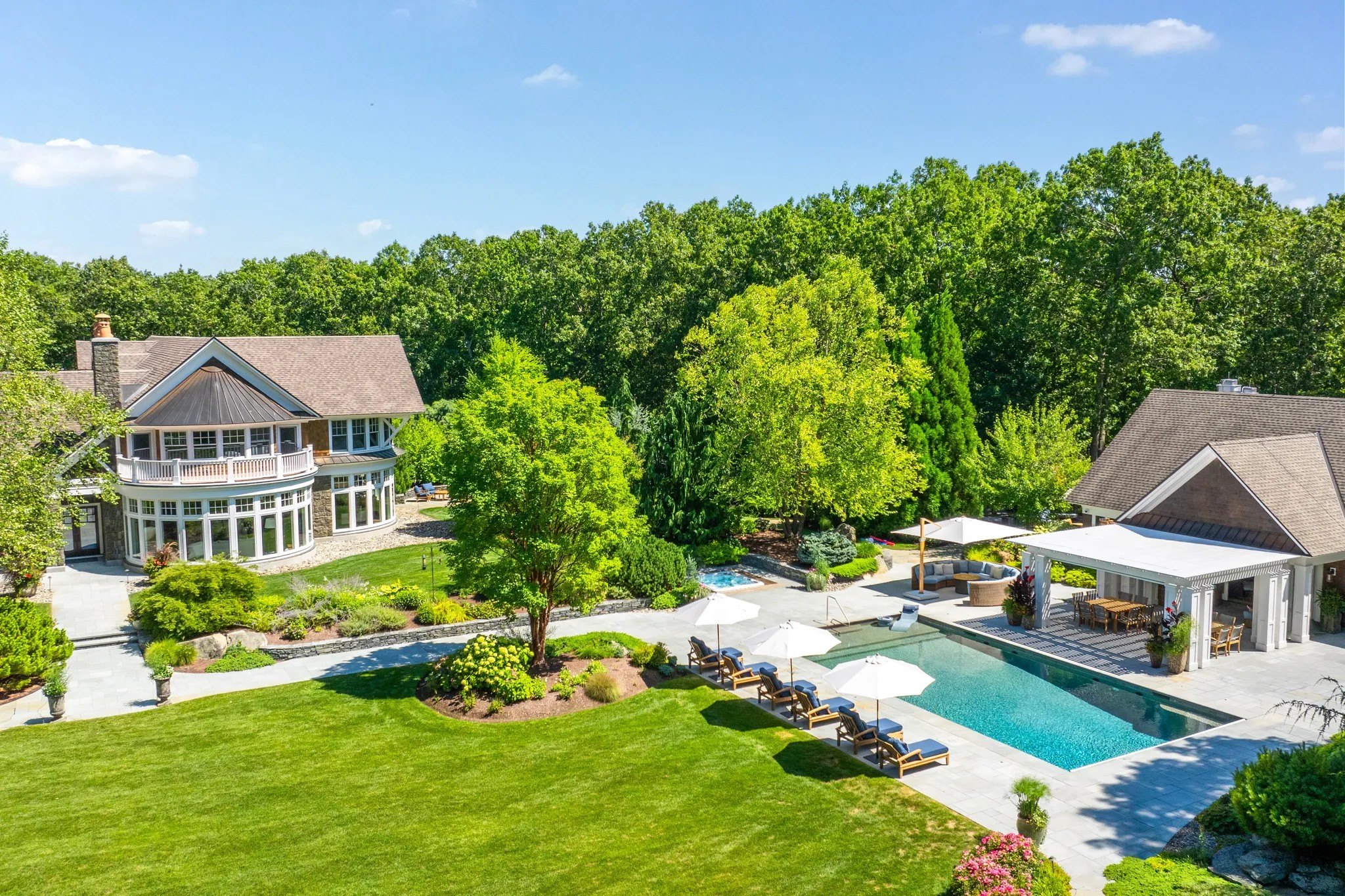 The backyard features a pool and cabana, among other luxe amenities. 