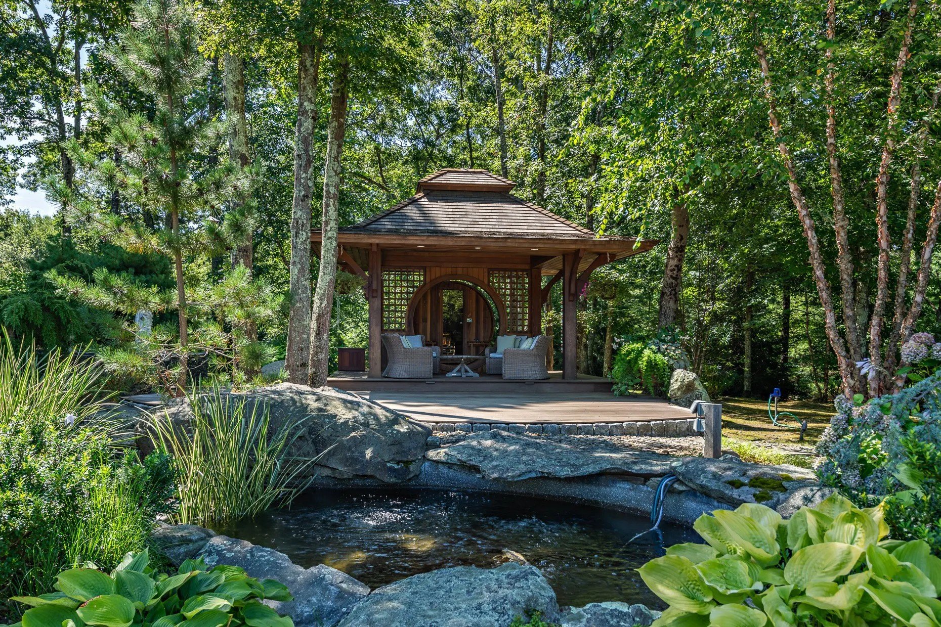 An outdoor sauna overlooking a koi pond is another luxe feature.