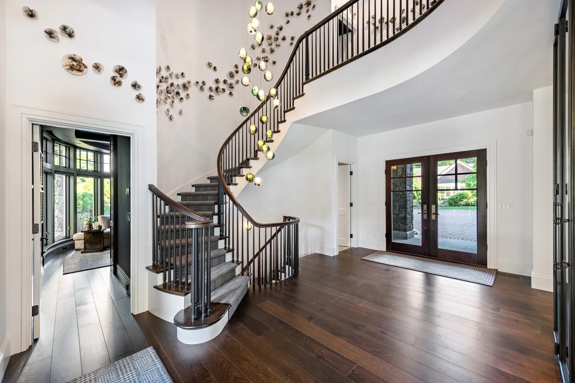 The light sculpture that illuminates the spiral staircase is equally impressive.