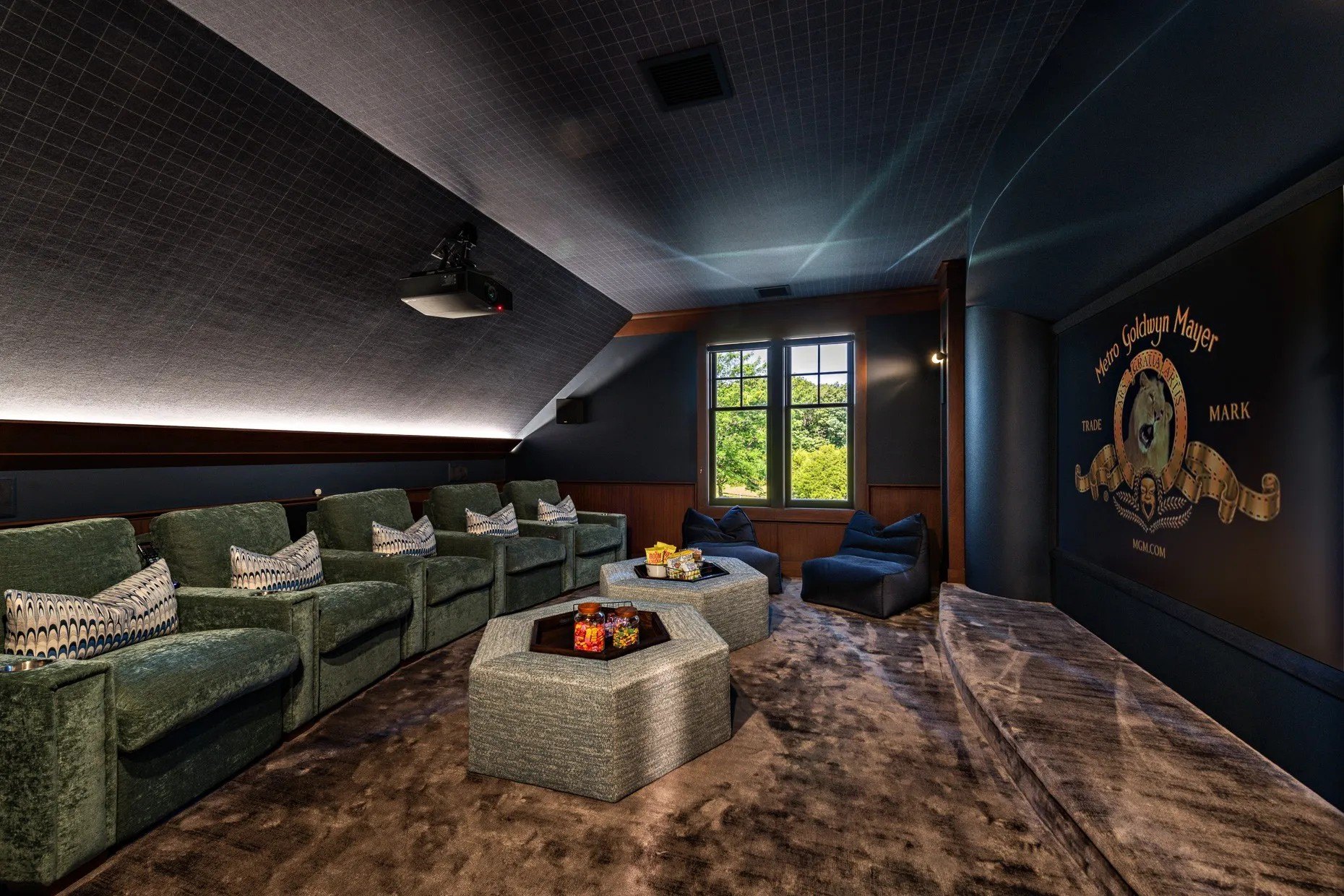 What grand estate would be complete without a fancy home theater?