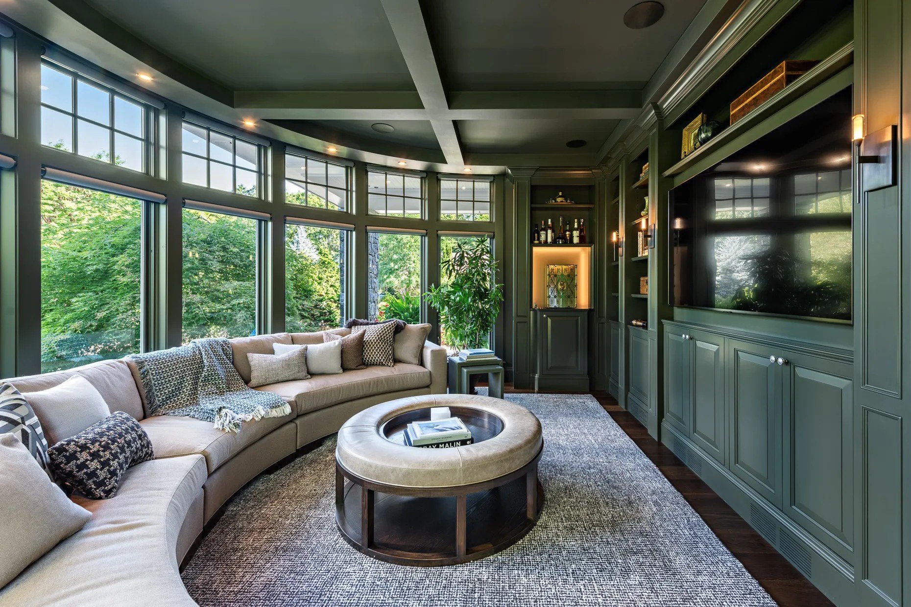 Lounges with floor to ceiling windows highlight the home.