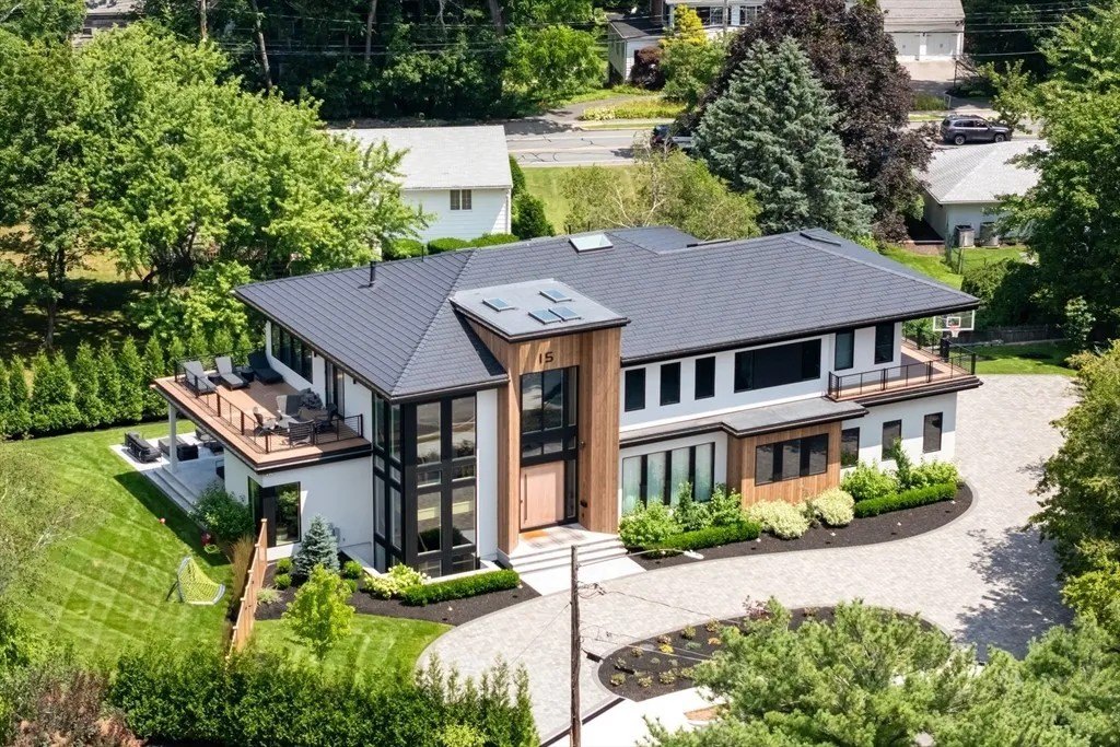 NBA Star Jrue Holiday Lists His Massachusetts Home For $6.9 Million—Weeks After Portland Trail Blazers Aerial of a luxury home in Massachusetts that belongs to Jrue Holiday