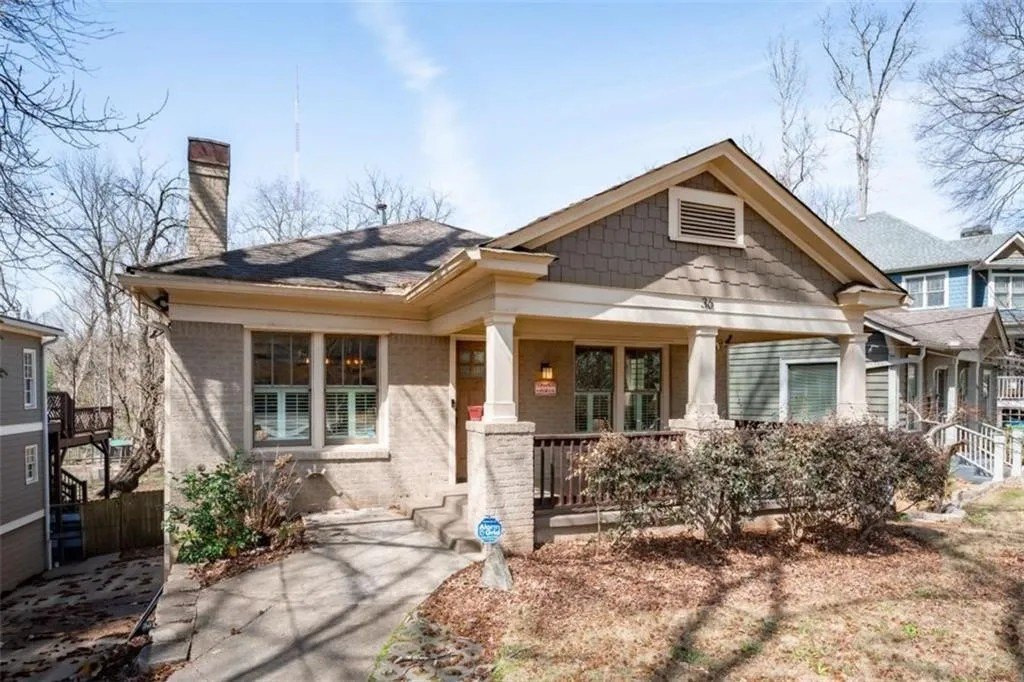 A Craftsman style house listed in a historic Atlanta suburb.