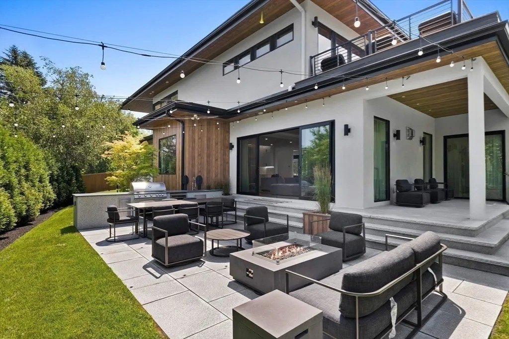 NBA Star Jrue Holiday Lists His Massachusetts Home For $6.9 Million—Weeks After Portland Trail Blazers Patio at a Luxury home in Massachusetts that belongs to Jrue Holiday