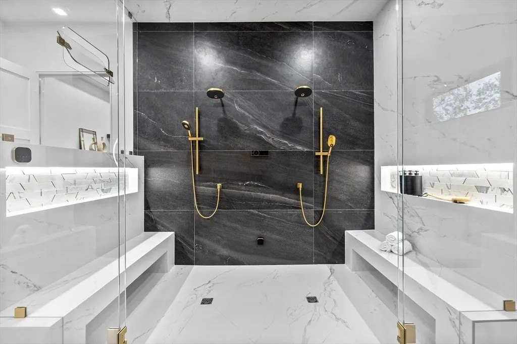 NBA Star Jrue Holiday Lists His Massachusetts Home For $6.9 Million—Weeks After Portland Trail Blazers Shower with gold and marble in a luxury home in Massachusetts that belongs to Jrue Holiday