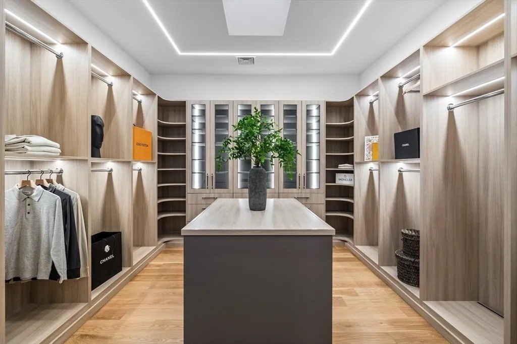 NBA Star Jrue Holiday Lists His Massachusetts Home For $6.9 Million—Weeks After Portland Trail Blazers Walk in closet in a luxury home in Massachusetts that belongs to Jrue Holiday